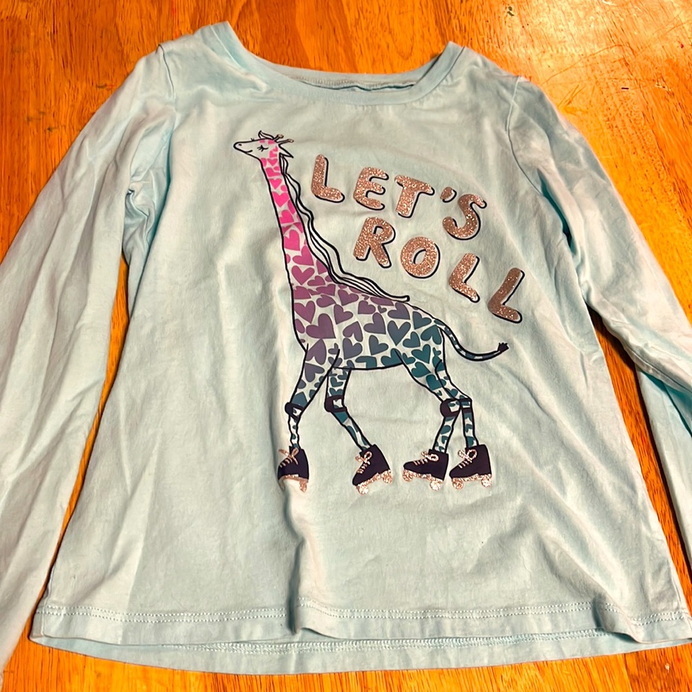 4 items for $9
 Carters Giraffe Roller Skating long Sleeve shirt